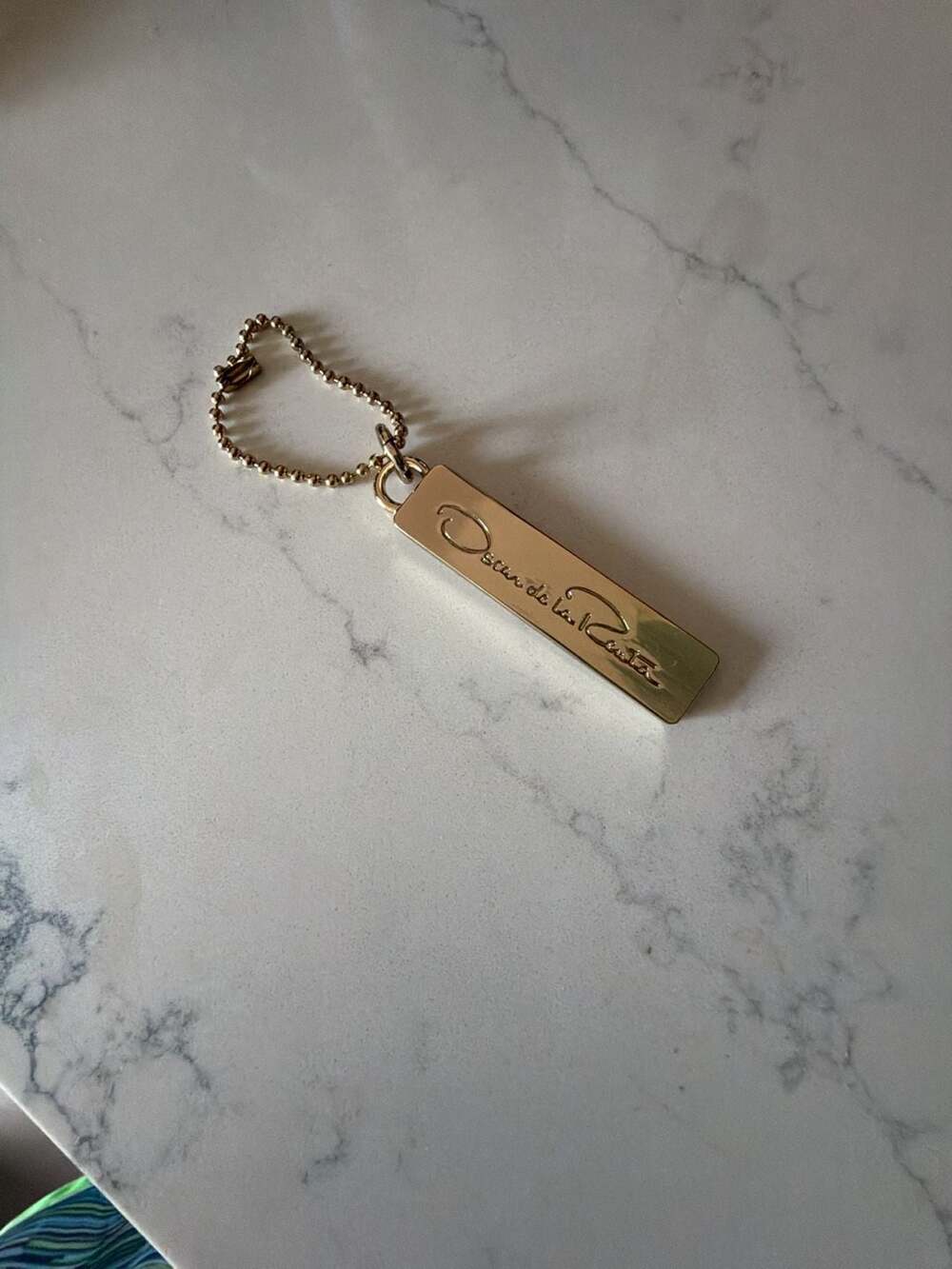 Oscar de la Renta Gold-Tone Logo Bar Keychain